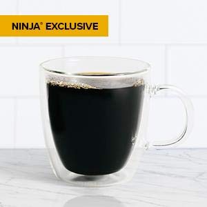    a cup of coffee, with texts above it reading as “Ninja exclusive”